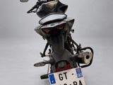 a motorcycle that has a license plate on the back of it