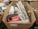 a box full of items that are sitting on the floor