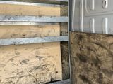 an image of the inside of a truck with the door open