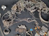 a lot of silver items that are on a table