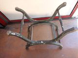 a metal chair that is sitting on the floor