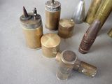 many different types of bullet shells on the table