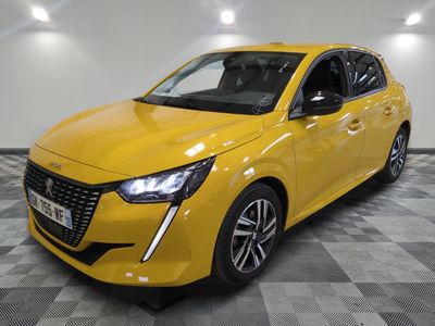 a yellow car is parked in a room with a checkered floor