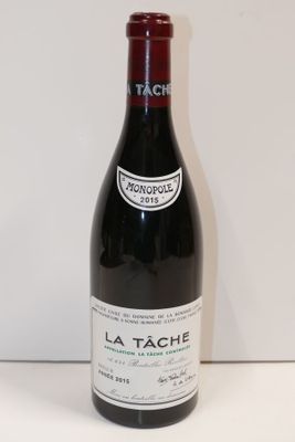 a bottle of wine that is sitting on a table