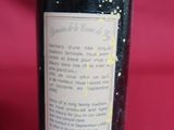 a bottle of wine that is sitting on a table