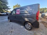 a van parked on the side of a road with a sticker on it