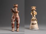 deux figurines représentant un homme et une femme en costume traditionnel