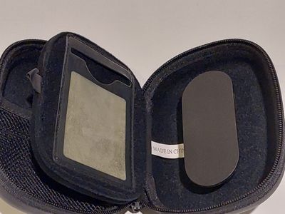 a black case with a cell phone inside of it