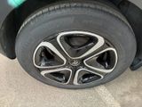 a close up of a tire on a car ' s rim