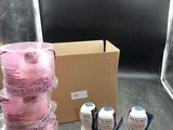 a lot of bottles of milk and a box on the floor