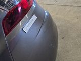 a car that has a sticker on the back of it