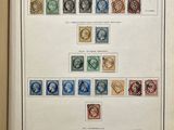 an open book with a bunch of stamps on it