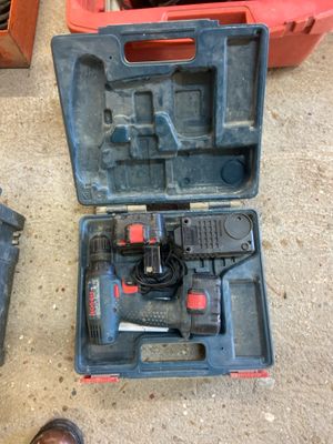 two tools in a case on the ground