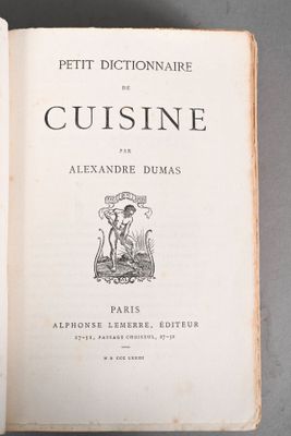 an open book with a picture of a woman sitting on a chair
