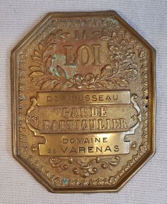 une image représentant une pièce d'or sur laquelle figure le nom d'une ville