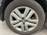 a close up view of a tire on a car