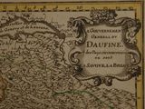 an old map of the country of france with a picture of a town