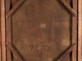 an old wooden frame with a square design on it