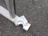 an image of a close up of a piece of metal on the ground