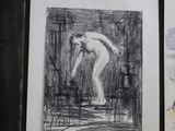 two drawings of a man on a skateboard are hanging on a wall