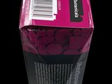 a pink box with a barcode on it sitting on a table