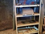 a shelf that has a lot of items on it
