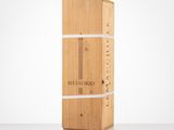 a wooden box with a knife on top of it sitting on a table