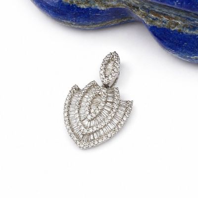 a close up of a diamond pendant on a lapel of lapel