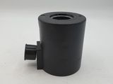 a close up of a black pipe on a white surface