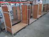 a lot of wooden cabinets in a warehouse with wheels