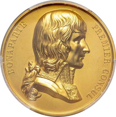 gold coin with a portrait of a man in profile on a white background