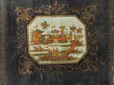 un vieux livre sur lequel figure l'image d'un bateau