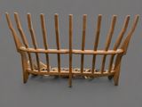 a wooden bench made out of sticks on a gray surface