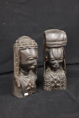 pair of african carved wood head sculptures