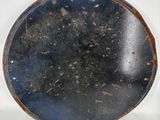 a blue plate sitting on top of a white table