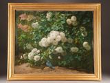 painting of white roses and a blue bird in a gold frame