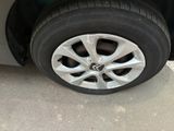 a close up of a tire on a car ' s rim