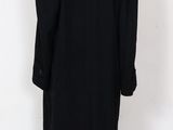 the back view of a black coat on a mannequin mannequin mannequin mannequin mannequin mannequin mannequin manne
