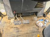 a close up of a machine that is sitting on the ground