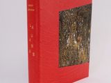 an image of a red book with a picture of a man on it
