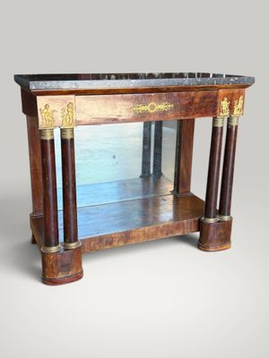 an image of a wooden table with a marble top and two columns