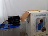 a box with a camera and a box with a printer on it