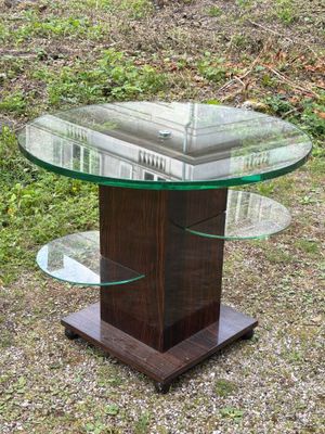 a close up of a glass table with a book on top of it
