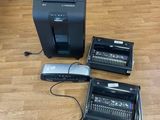 three different types of electronic equipment sitting on the floor