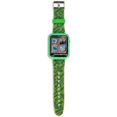 un gros plan d'une montre avec un bracelet vert
