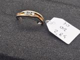 a close up of a ring with a price tag attached to it