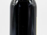 a bottle of wine that is sitting on a table