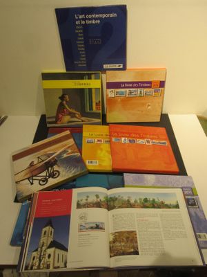 a lot of books that are on a table