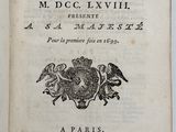 an open book with a picture of a bird on it ' s cover
