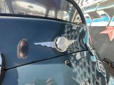 a close up of a car with a sticker on it